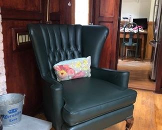 Leather Wing chair with matching ottoman 