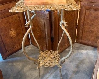 Marble top cast iron plant stand