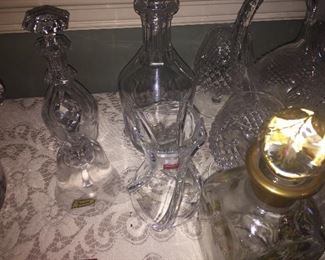 several Baccarat decanters