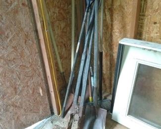 shovels, post hole digger, rakes
