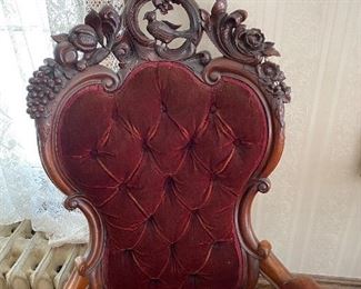 Gorgeous detail of bird carved into chairback - crushed velour upholstery.