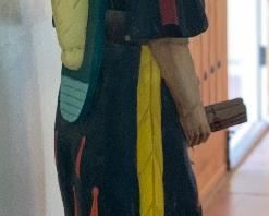 Life-size Carved wood Cigar Store Indian Woman w/ papoose	70x19x16in	HxWxD
