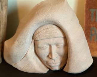 Bruce Law Carved Sand Stone Native American Face	11x14x6in	HxWxD
