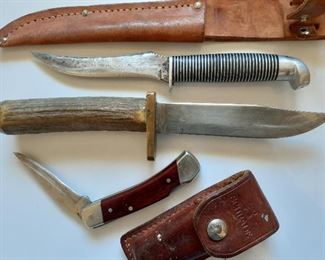 Vintage Western "Black Beauty" (top) and Brusletto hunters' knifes, and Schrade Uncle Henry LB5