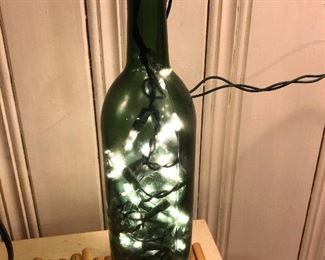 All right that is a bottle with a bunch of twinkle lights plooshed into it and I gotta say, "Cher! That is a bundle item!! Does it really deserve headline space here?"