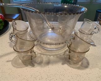 Candlewick punch bowl set. $75 
has under plate and 12 cups 