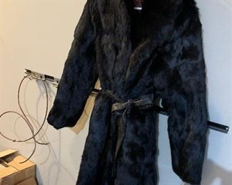 Genuine rabbit skin / fur black fur coat with tags .