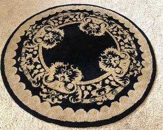 Large round black rug