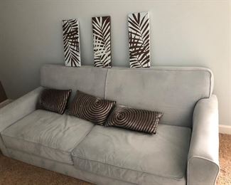 Pair of Teal 2 cushion Sofa / Couches with decor pillows and matching art, as is