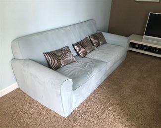 Pair of Teal 2 cushion Sofa / Couches with decor pillows and matching art, as is