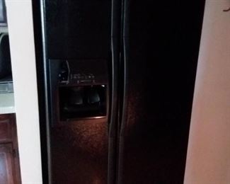 Black Side by Side Whirlpool Refrigerator approx 5yrs with ice/water dispenser