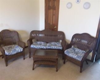 All weather 4 piece wicker set- loveseat, 2 chairs, and coffee table