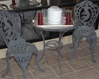 $125.00-Black Metal Kokopelli Side Table with 2 Chairs