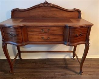 Antique sideboard buffet with dovetailed drawers and wooden casters