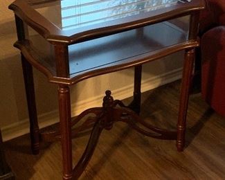 Two-tiered glass topped lamp display table