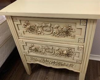 Ornate night stand with drawers