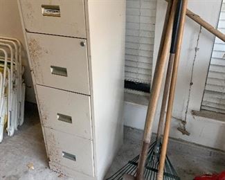 Metal file cabinet, yard tools