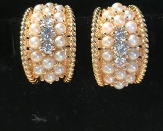 Diamond, pearl and gold earrings.