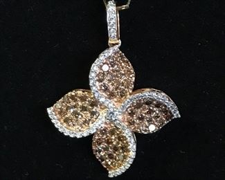 White and colored diamond pendant.