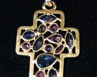18kt gold and sapphire cross. 1 1/2" long