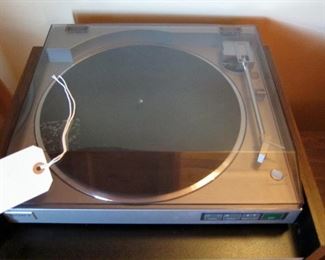 Turntable included with the stereo.