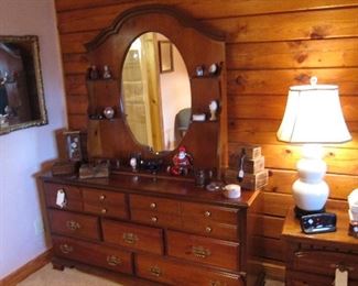 Bedroom dresser with a mirror.