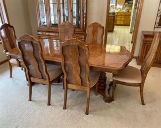 Bernhardt dining set.  Comes with one captain’s chair, 5 side chairs, two leaves and full table pads 