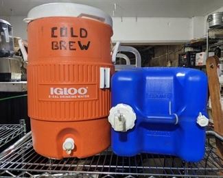 (2) Beverage Dispensers, (1) Five Gallon Igloo Dispenser, (1) Reliance 22 Liter Aqua-Tainer