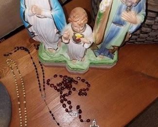 Religious items. Rosaries, statues