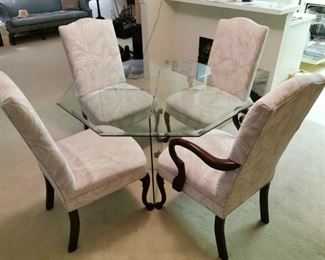 48" diameter Design Line Glass Table & 4 upholstered chairs.&nbsp;