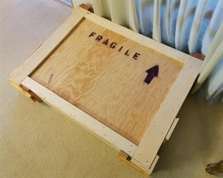 custom made wood shipping crate - custom made, exterior dimensions aprox 43"x34"x8", interior has styrofoam lining, cardboard interior dimensions aprox 37¼" x 25&nbsp;½"&nbsp;x 2" 