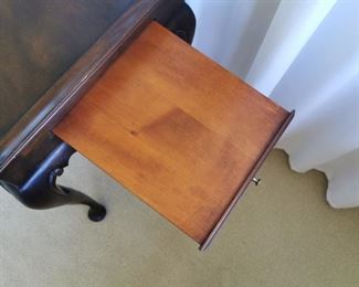 Queen Anne Mahogany Tea Table with pull out candle slide ends.