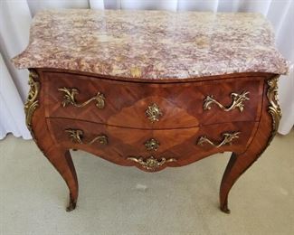 2 drawer&nbsp;Century Louis XV Style Marquetry Commode with Ormolu Mounts and Marble top, stamped (incised) J. B. Moreau and a fleur de lis & five point star