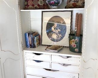 Inside armoire- 2 shelves and back sliding door that opens for tv