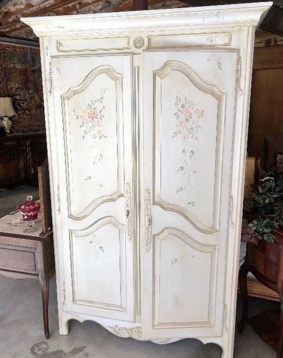 Ethan Allen hand painted armoire. Has 2 shelves inside and lots of drawer space. Plenty of space to hide a TV.        21l x 16w x 80h