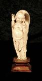 JAPANESE CARVED IVORY FIGURE OF A WISEMAN. SHAPED TEAKWOOD BASE. GOOD. 7 1/8" H.