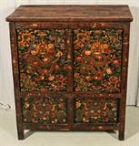 ANTIQUE TIBETAN PAINTED CABINET WITH DOUBLE DOORS, SLIDING PANELS ON THE BOTTOM. PAINTED FINISH OF A DRAGON AND FLOWERS. GOOD. 37 1/2" H X 34" WX 19" D.