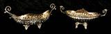 TWO GERMAN 800 SILVER BOAT SHAPED BOWLS. FLORAL DECORATION. GILT WASHED INTERIOR. 17.5 TROY OZ. FOR BOTH. 5" H X 11" W X 4 1/2" D. GOOD. 4 1/2" H X 10" W.