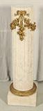 ANTIQUE REEDED MARBLE PEDESTAL WITH DORE BRONZE FLORAL SWAGS. GOOD. 42" H X 12 1/2" DIA.