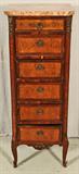 ANTIQUE 6 DRAWER INLAID LINGERE CABINET WITH A SHAPED MARBLE TOP. BRONZE MOUNTS. VENEER MISSING ON FRONT. 45" H X 17" W X 12" D.