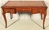 ANTIQUE LOUIS XV STYLE 3 DRAWER WRITING DESK. BRONZE MOUNTS. INSET LEATHER TOP. NEEDS REFINISHING. 30" H X 51 1/2" W X 26 1/2" D.