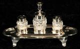 18th C. ENGLISH SILVER INKWELL. THREE BOTTLES. MAKER HENRY CHAWNER, LONDON 1795-6. TWO OF THE BOTTLES HAVE CHIPPED BASES. 4 1/2" H X 8 1/4" W X 3 1/2" D.