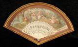 ANTIQUE HAND PAINTED FAN. CARVED IVORY STICKS. DEPICTING FIGURES IN A PARK SETTING. GILT WOOD SHADOW BOX FRAME. GOOD. 10" H X 18" W.