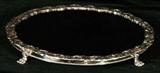 LARGE ROUND ENGLISH VICTORIAN FOOTED PLATEAU. SILVER PLATED VINTAGE DESIGN ON THE BORDEER. GOOD. 1 3/4" H X 21" DIA.