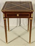 FRENCH LOUIS XVI STYLE ENVELOPE GAME TABLE. MAHOGANY WITH ORMOLU MOUNTS AND INSET ORMOLU BANDS ON THE TURN REEDED LEGS. SINGLE DRAWER. GREEN FELT GAME SURFACE. SIGNED V ve P. SORMANI, 10r CHURLOT, PARIS. GOOD. 29 1/2" H X 23" SQ.