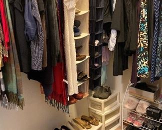 Main floor, master walk-in closet. Size 9 1/2-10 women's   shoes, sandals.  Size large nice clothing, more scarves hanging up. 