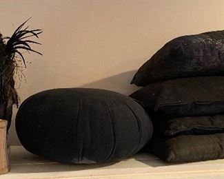 Black pillows in all shapes and sizes and lamp shades For a pair of sconces