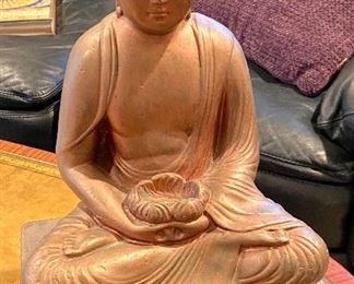 one of several budda statues in the house