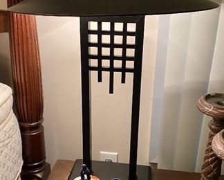 cool looking metal lamp similar to an arts and crafts piece but a modern version