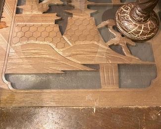 a closer look at the carved coffee table top